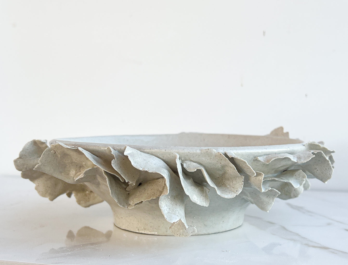 Shallow organic ruffle bowl