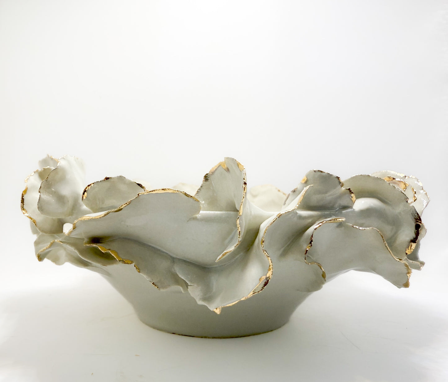 Shallow gold rimmmed ruffle bowl